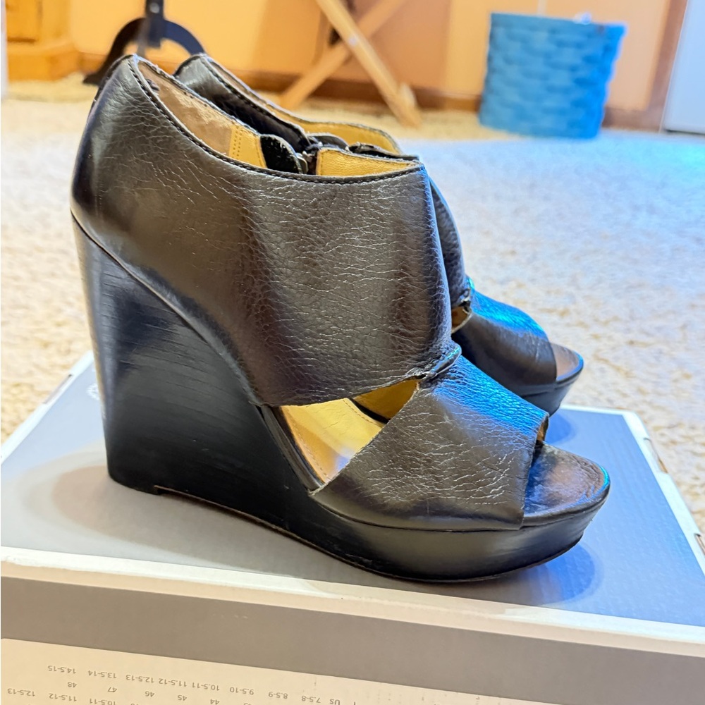 Coach Black leather top and leather sole Peep-Toe Wedges